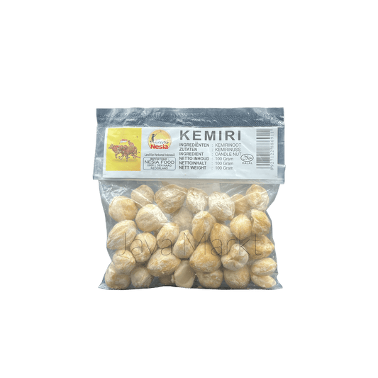 Nesia Kemirinusse, traditionelle kemirinüsse in einer transparenten Schale, natürliche Quelle für Nährstoffe, Nahaufnahme